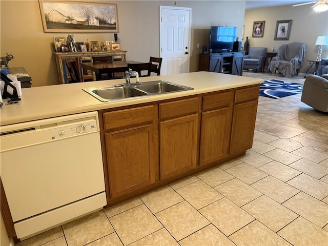 6297/6299 W Milliken Bnd, Fayetteville, AR 72704 - kitchen with light countertops, brown cabinets, a sink, open floor plan, and dishwasher