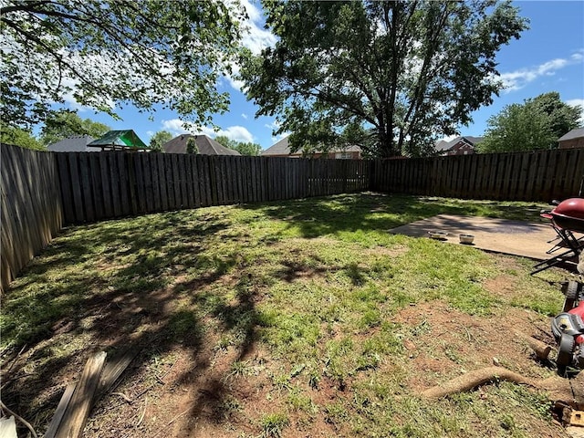 6297/6299 W Milliken Bnd, Fayetteville, AR 72704 - view of yard with a fenced backyard and a patio area