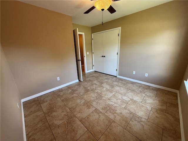 6297/6299 W Milliken Bnd, Fayetteville, AR 72704 - empty room with a ceiling fan and baseboards