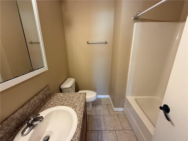 6297/6299 W Milliken Bnd, Fayetteville, AR 72704 - bathroom with tile patterned floors, toilet, baseboards, and vanity