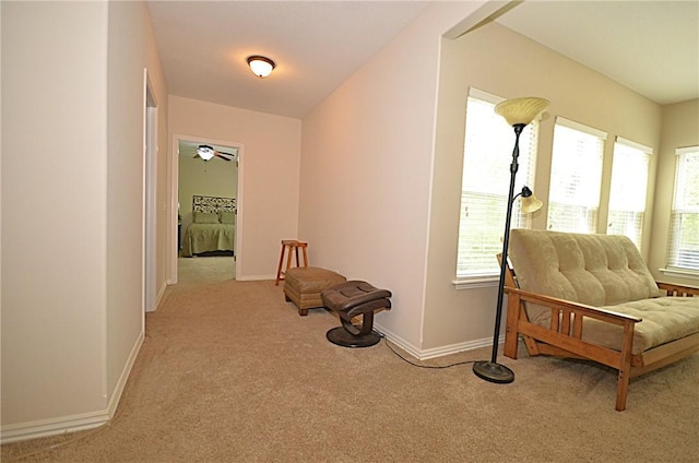 42 Sable Dr, Bella Vista, AR 72715 - living area featuring baseboards, a healthy amount of sunlight, and carpet floors