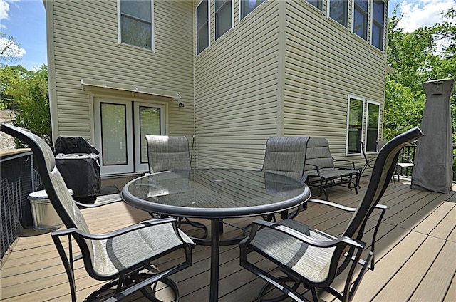 42 Sable Dr, Bella Vista, AR 72715 - wooden deck featuring outdoor dining area