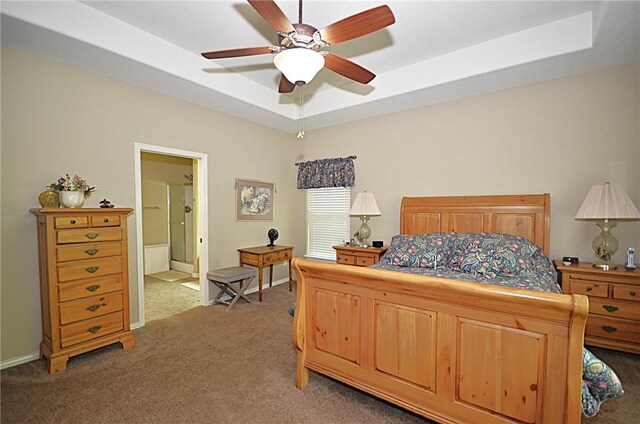 42 Sable Dr, Bella Vista, AR 72715 - bedroom with a ceiling fan, baseboards, a raised ceiling, ensuite bath, and light carpet