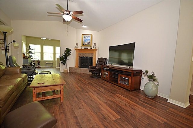 42 Sable Dr, Bella Vista, AR 72715 - living room with lofted ceiling, wood finished floors, ceiling fan, baseboards, and a tiled fireplace
