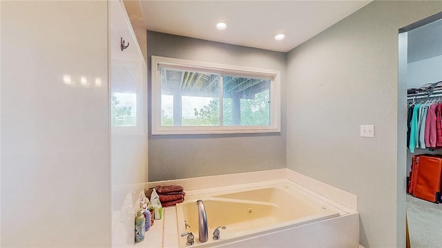 2341 N Fox Trl, Fayetteville, AR 72703 - full bathroom featuring a jetted tub and a walk in closet
