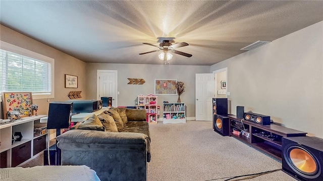 2341 N Fox Trl, Fayetteville, AR 72703 - carpeted living area featuring visible vents and ceiling fan
