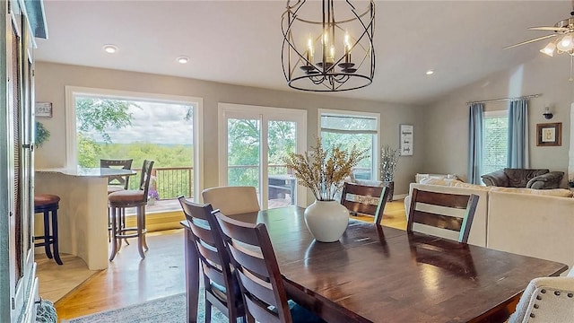 2341 N Fox Trl, Fayetteville, AR 72703 - dining area featuring recessed lighting, light wood-type flooring, plenty of natural light, and ceiling fan with notable chandelier