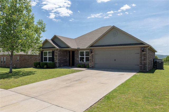 2300 Double Bogey Ln, Farmington, AR 72730 - ranch-style house featuring concrete driveway, a front lawn, brick siding, and an attached garage