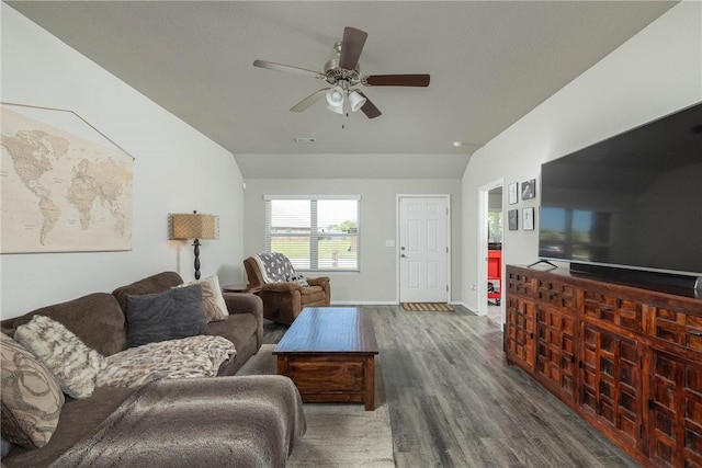 2300 Double Bogey Ln, Farmington, AR 72730 - living area with lofted ceiling, baseboards, ceiling fan, and wood finished floors