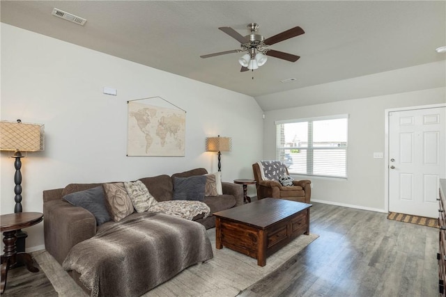 2300 Double Bogey Ln, Farmington, AR 72730 - living room featuring lofted ceiling, wood finished floors, visible vents, a ceiling fan, and baseboards