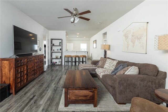 2300 Double Bogey Ln, Farmington, AR 72730 - living room featuring visible vents, wood finished floors, and ceiling fan