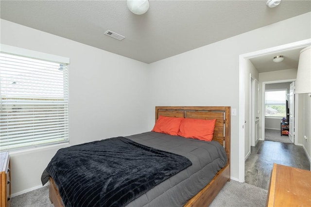 2300 Double Bogey Ln, Farmington, AR 72730 - carpeted bedroom with visible vents and baseboards