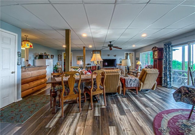 dining space featuring a paneled ceiling, recessed lighting, dark wood finished floors, and ceiling fan