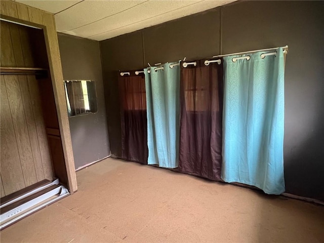 unfurnished bedroom with light carpet