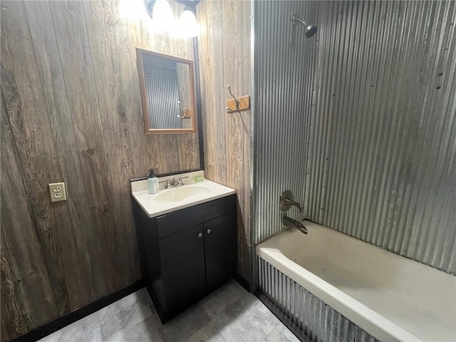 bathroom with vanity and bathtub / shower combination