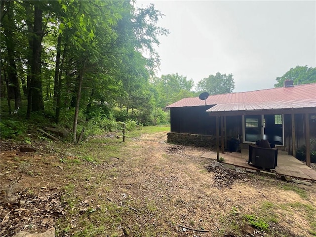 view of yard with a wooden deck