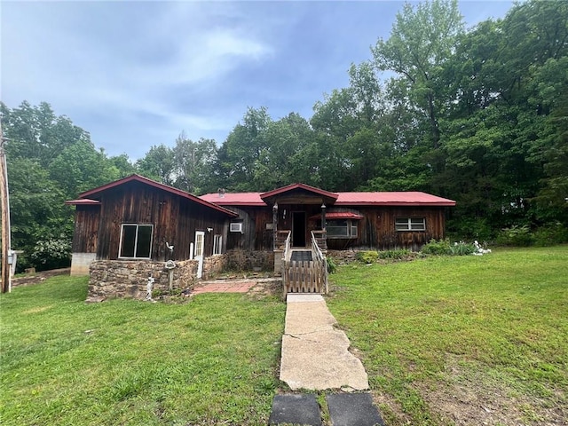 view of front of home with a front lawn