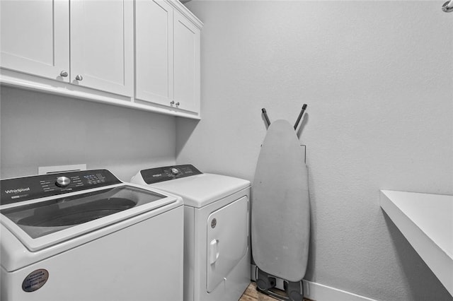 252 Forza Ln, Tontitown, AR 72762 - laundry area with cabinet space and washer and dryer