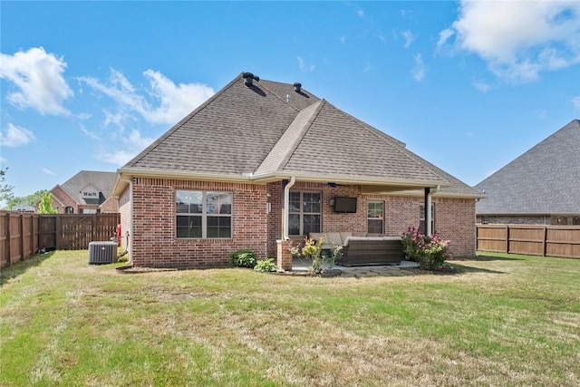 252 Forza Ln, Tontitown, AR 72762 - rear view of property with a fenced backyard, brick siding, a shingled roof, and central AC