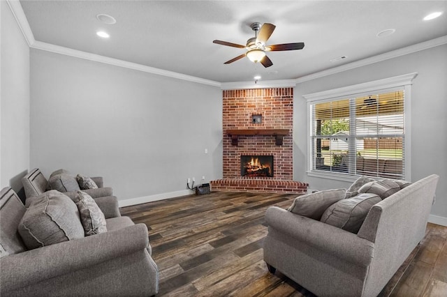 252 Forza Ln, Tontitown, AR 72762 - living room featuring wood finished floors, a brick fireplace, crown molding, ceiling fan, and recessed lighting