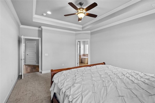 252 Forza Ln, Tontitown, AR 72762 - carpeted bedroom featuring a tray ceiling, baseboards, ensuite bath, ceiling fan, and crown molding