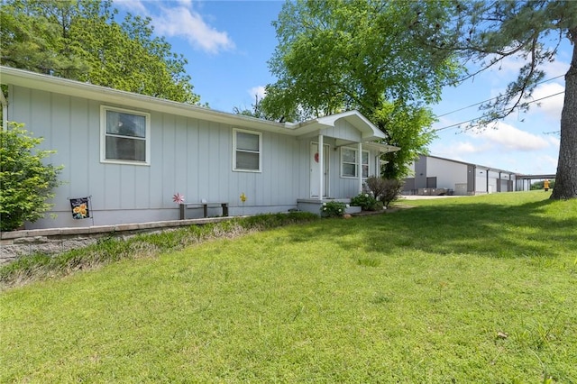 single story home with a front yard