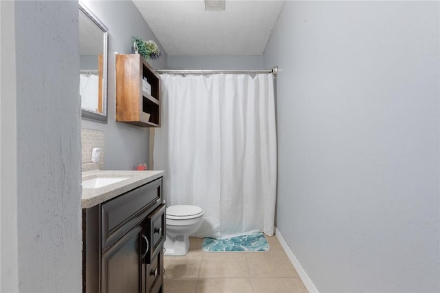 full bathroom with toilet, tile patterned flooring, vanity, and a shower with shower curtain