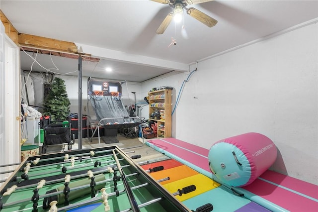 game room with a ceiling fan