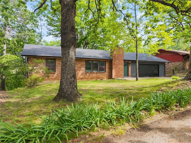 5 College St, Eureka Springs, AR 72632 - view of front of house with a chimney, a garage, a front lawn, and brick siding