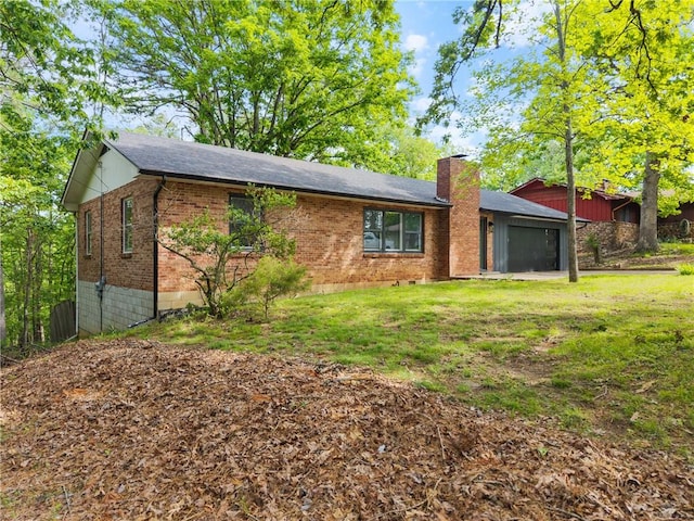 5 College St, Eureka Springs, AR 72632 - view of front of property with brick siding, a chimney, a front yard, and a shingled roof