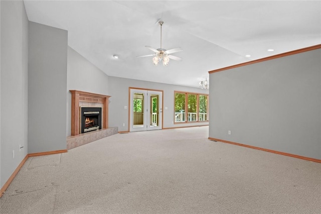 4 Tisbury Ln, Bella Vista, AR 72715 - unfurnished living room with lofted ceiling, baseboards, a ceiling fan, a warm lit fireplace, and carpet flooring
