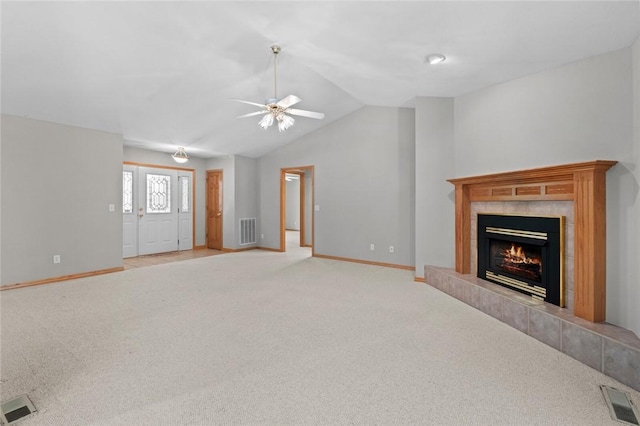 4 Tisbury Ln, Bella Vista, AR 72715 - unfurnished living room with a ceiling fan, a fireplace, vaulted ceiling, light colored carpet, and baseboards
