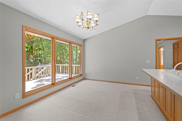 4 Tisbury Ln, Bella Vista, AR 72715 - unfurnished dining area featuring vaulted ceiling, a chandelier, baseboards, and light carpet