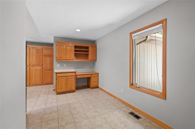 4 Tisbury Ln, Bella Vista, AR 72715 - kitchen with open shelves, baseboards, light countertops, and recessed lighting