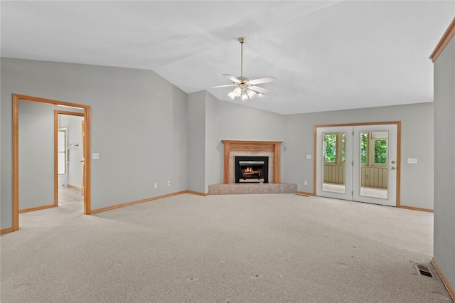 4 Tisbury Ln, Bella Vista, AR 72715 - unfurnished living room with lofted ceiling, a ceiling fan, carpet, baseboards, and a fireplace