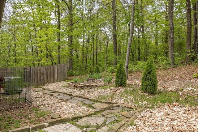 8 Eddy Ln, Bella Vista, AR 72715 - view of yard featuring fence and a view of trees