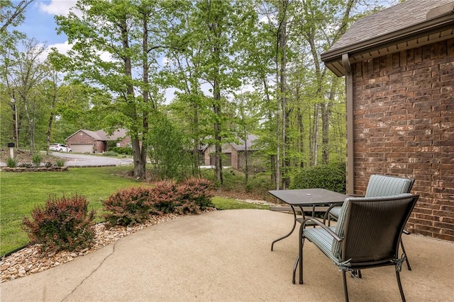 8 Eddy Ln, Bella Vista, AR 72715 - view of patio featuring outdoor dining space