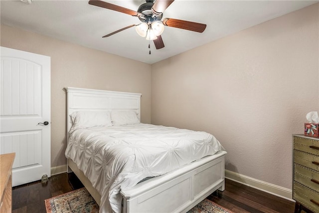 8 Eddy Ln, Bella Vista, AR 72715 - bedroom with baseboards, wood finished floors, and a ceiling fan