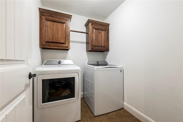 8 Eddy Ln, Bella Vista, AR 72715 - clothes washing area featuring washing machine and dryer, cabinet space, baseboards, and tile patterned floors