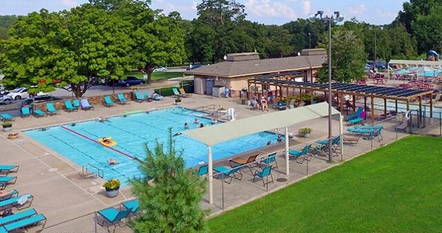 8 Eddy Ln, Bella Vista, AR 72715 - community pool with a lawn