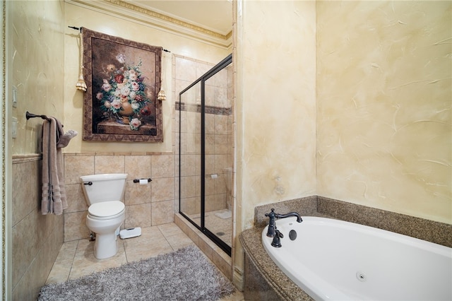 bathroom with a stall shower, tile walls, a whirlpool tub, toilet, and ornamental molding