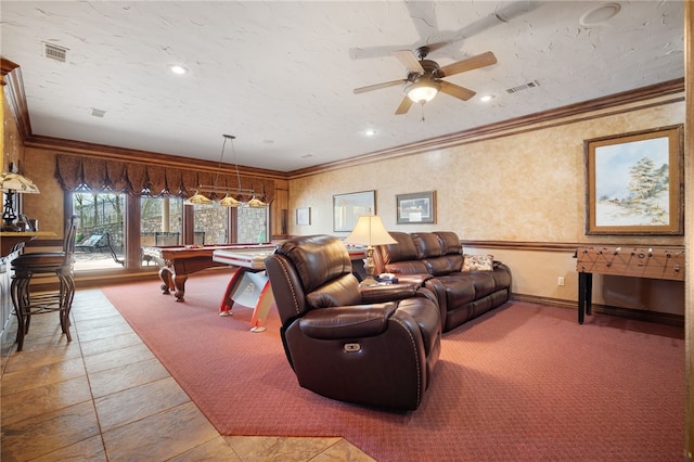 living room featuring visible vents, crown molding, light carpet, ceiling fan, and billiards