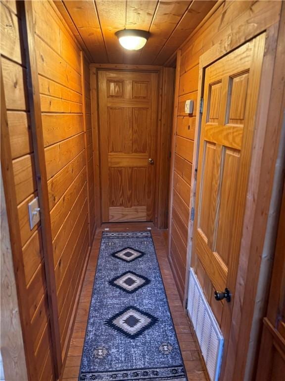 2132 County Road 246, Berryville, AR 72616 - entryway featuring wood walls and visible vents