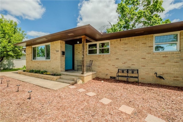 314 Crestview Dr, Bentonville, AR 72712 - view of front of property with brick siding and crawl space