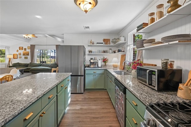 101 Carter Ln, Elkins, AR 72727 - kitchen featuring green cabinetry, stainless steel appliances, open shelves, and a sink