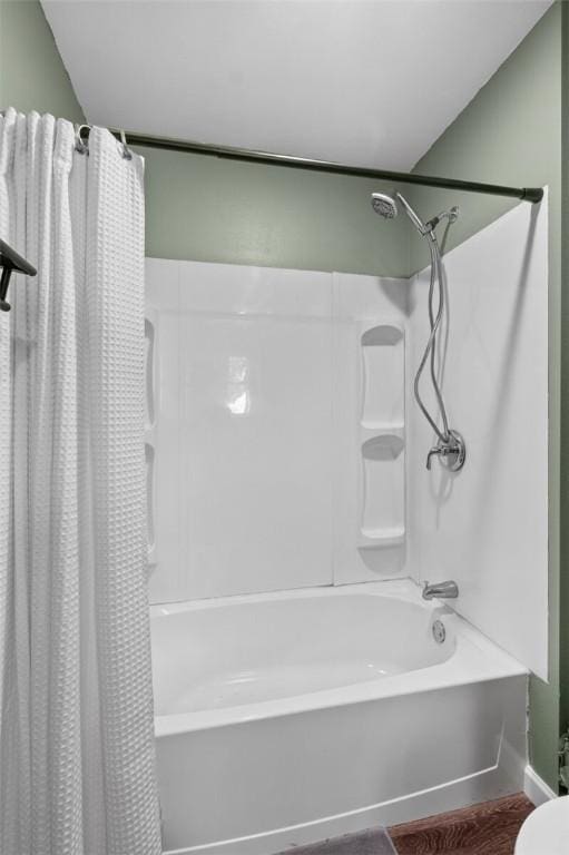 101 Carter Ln, Elkins, AR 72727 - bathroom with wood finished floors and shower / bathtub combination with curtain