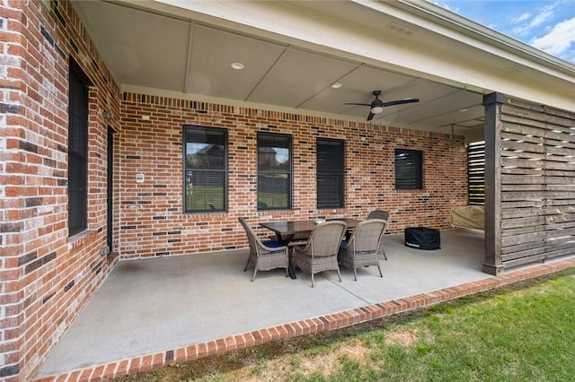 view of patio featuring a ceiling fan