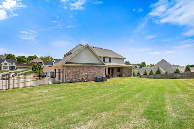 back of property with brick siding and cooling unit