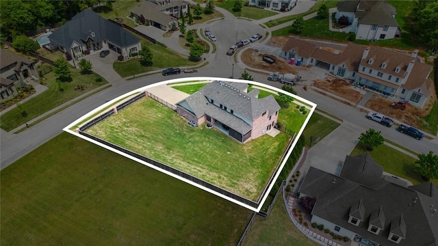aerial perspective of suburban area with property parcel outlined