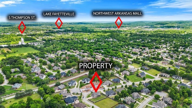 view of property location featuring nearby suburban area